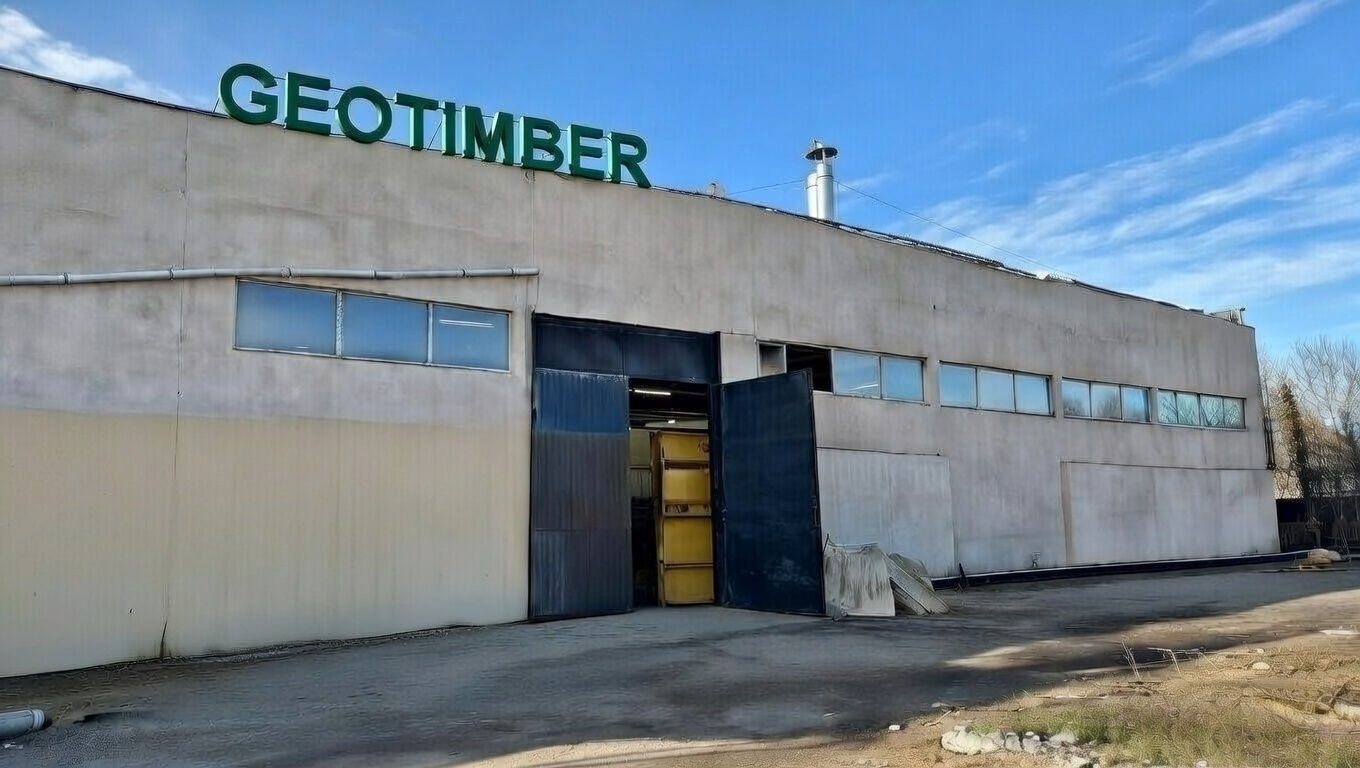 Plywood manufacturing facility and stacked sheets in production